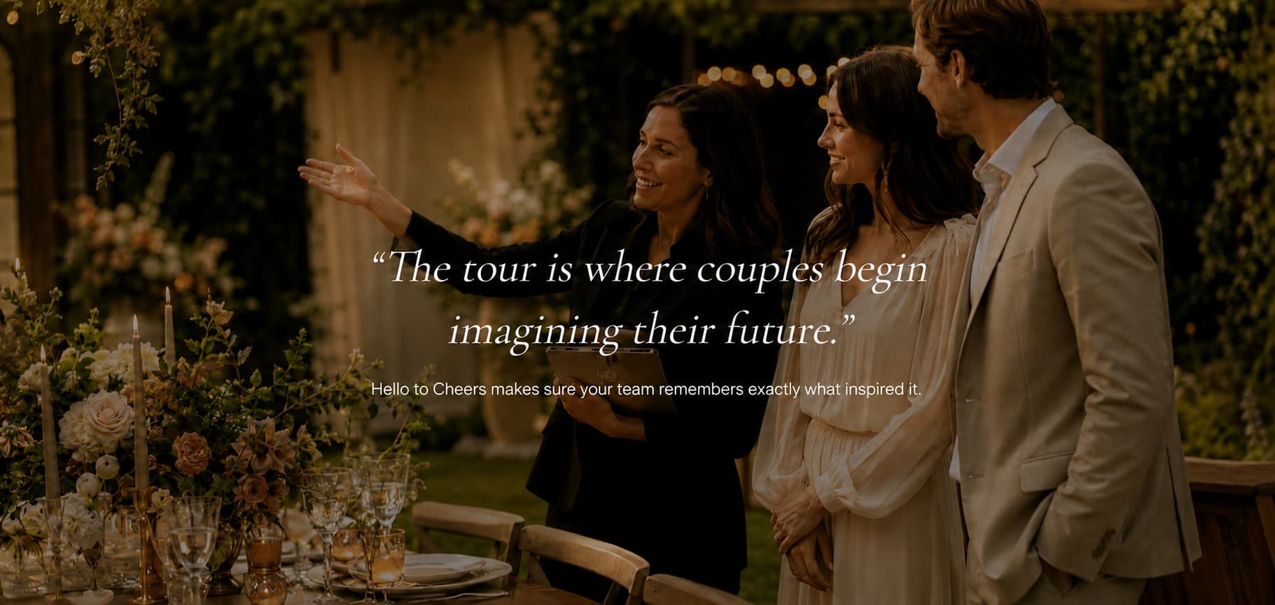 Venue host touring a couple through a candlelit outdoor setup — where imagination begins